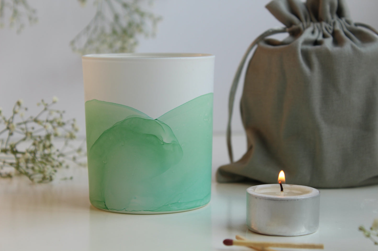 Green painted glass pot