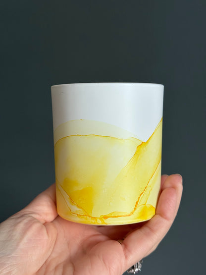 Yellow painted glass pot