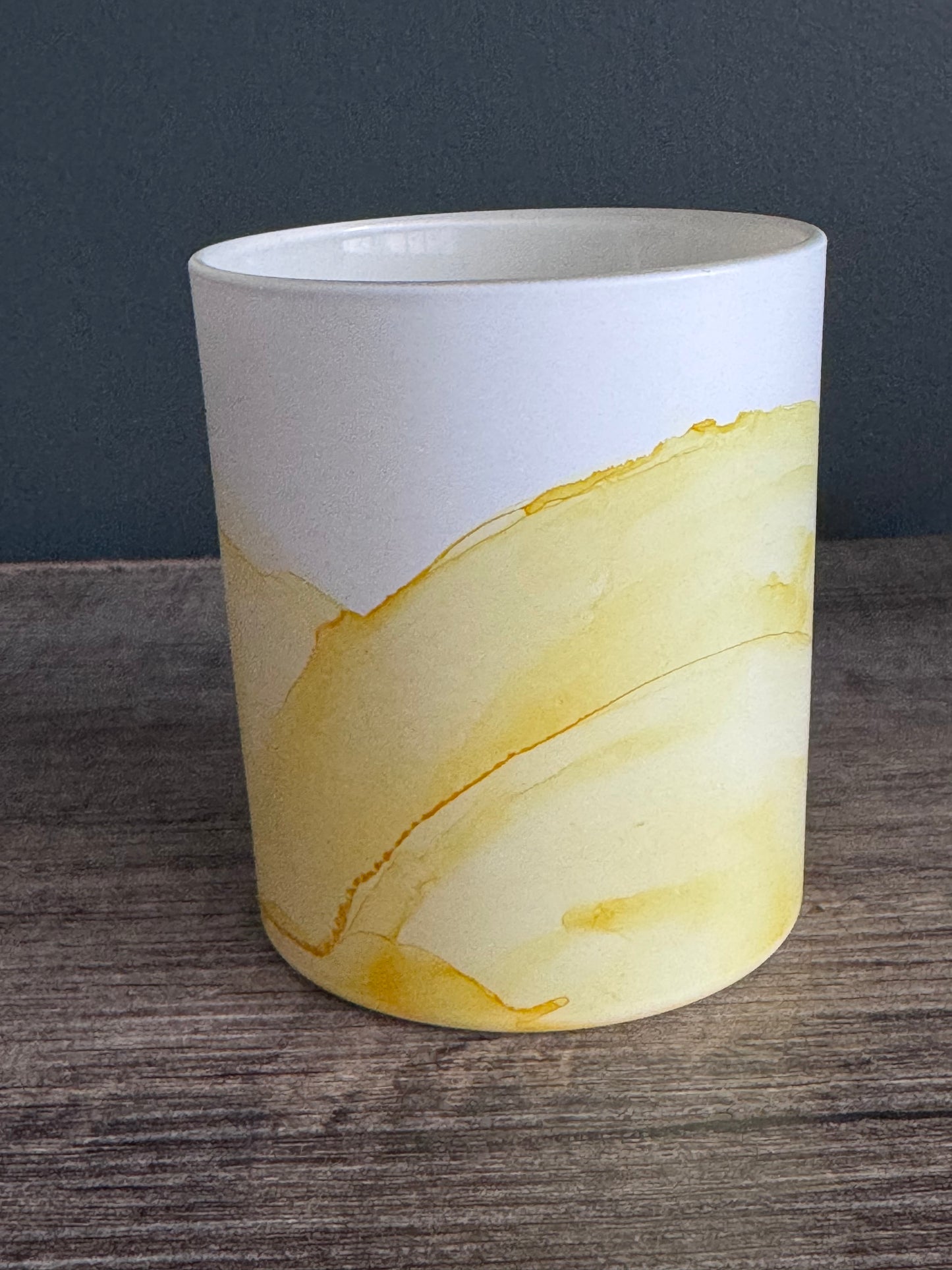 Yellow painted glass pot